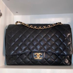 Chanel Maxi double flap black caviar with 24 karat gold